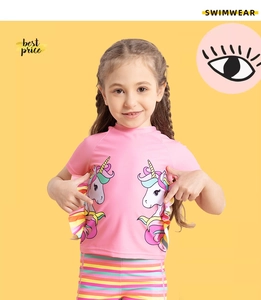 Detail of girls unicorn print two-piece swimwear with pink ruffled short sleeve top