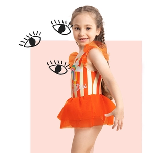 Detail of girls' striped rainbow swimsuit featuring orange tutu skirt and mesh sleeves