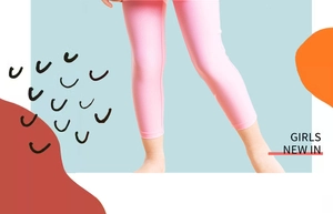 Detail of pink girls leggings with stretch fit and sun protection for active swim wear
