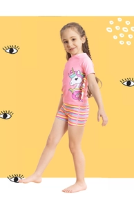 Detail of pink girls' swimwear featuring unicorn print and ruffled short sleeve edges