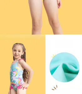 Detailed views of unicorn swimsuit showing rainbow patterns and pink ruffle hem details