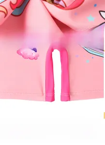 Detail view of the soft skin-friendly fabric and high-quality stitching on unicorn swimwear