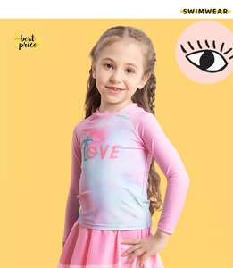 Detail of girls' long-sleeve swimwear with pleated skirt and sun protection fabric