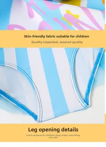 Detail of blue and white striped kids' swimsuit with safety stitching and mesh skirt fabric