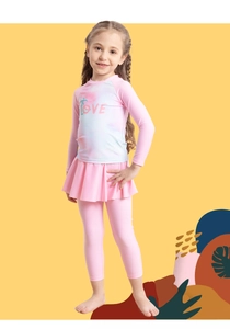 Detail of girls' long sleeve swimwear set with LOVE print and pink sun protection pants