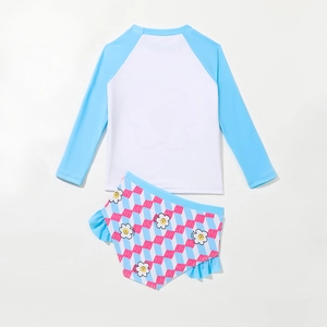 Girls long sleeve two-piece swimsuit with floral print and ruffle trim in blue and white