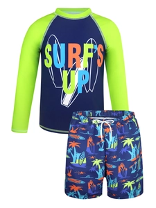 Close-up of boys long-sleeve rash guard and tropical print shorts with drawstring
