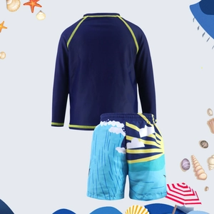 Detail of kids two-piece swimwear set showing yellow beach wave pattern and sun graphics