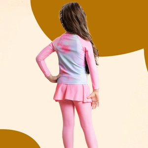 Pink girls two-piece long sleeve swimwear with tie-dye back and skirted swim pants