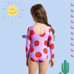 Girl's long sleeve one-piece swimsuit featuring red tomato prints on light purple base