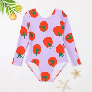 Long-sleeve girls' one-piece swimsuit with red tomato print on a purple base for sun protection