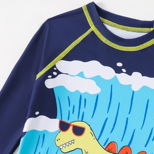 Detail of boys long sleeve surfing swimsuit with blue fabric and neon green stitching