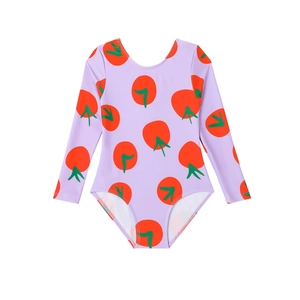 Long-sleeve children's swimsuit in light purple with all-over red tomato print pattern