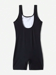 Detail of girls one-piece swimsuit featuring wide straps and a deep U-shaped back design