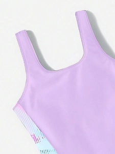 Detailed close-up of light purple girls swimsuit with colorful striped side panels
