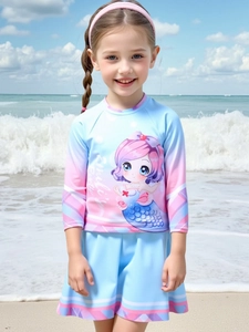 Detail of girls two-piece mermaid swimsuit with long sleeves and sun protection