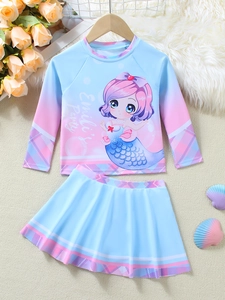 Flat lay of girls long sleeve mermaid swimsuit with gradient pink and blue colors