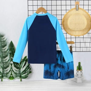 Boys' long-sleeve two-piece swimsuit set with blue palm tree print for summer beach sun protection