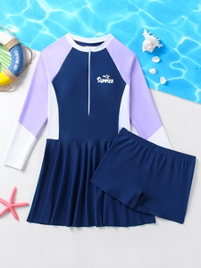 Detail of girls' long-sleeved two-piece swimwear with front zipper and summer graphics