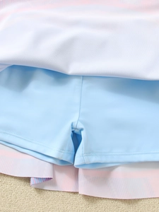 Detail view of double-layer girls' swimsuit with inner light blue security shorts