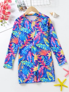 Detail of girls' long sleeve one-piece swimsuit with tropical floral print and front zipper
