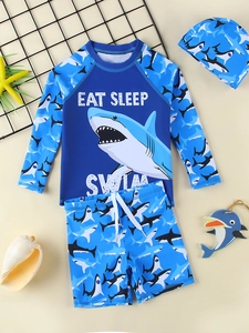 Three-piece boys' shark swimwear set with long sleeves, swim shorts and matching hat