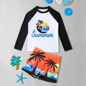 Boy's long-sleeve two-piece swimwear set with coconut tree print and sun protection