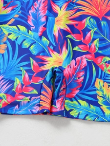 Macro view of flatlock stitching and sewing quality on quick-dry tropical floral swim shorts
