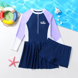 Girls long sleeve sun protection swimwear set with lilac and navy blue summer pattern