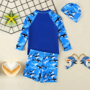 Three-piece boys' swimwear set with shark print long sleeve top, shorts and swimming cap