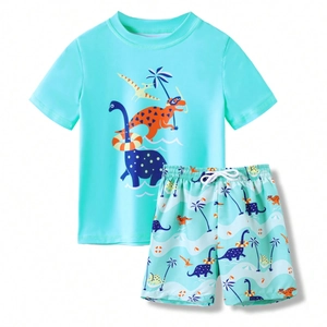 Kids two-piece dinosaur swimwear set with short sleeve rash guard and swim trunks