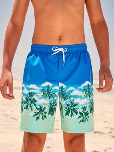 Detail der Badehose für Jungen mit Palmenprint, Farbverlauf und Kordelzug am Bund