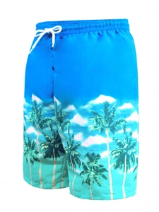 Detail der Jungen-Badeshorts mit blau-grünem Farbverlauf und Palmen-Print-Muster