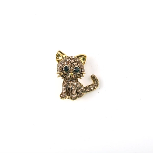 Cute cat brooch with champagne rhinestones and blue oil drip finish for suits