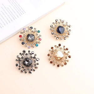 Starburst crystal brooch pins in multiple colors with sparkling rhinestone rays