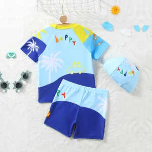 Three-piece boy swimming set with blue dinosaur pattern short sleeve top and trunks
