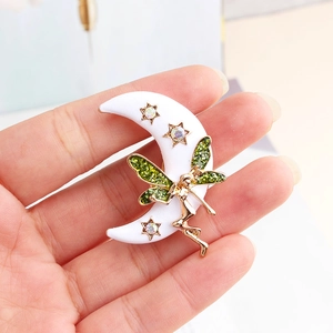 Broche fée et lune en alliage avec ailes à paillettes vertes et étoiles dorées brillantes