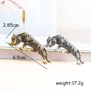 Fashionable tiger-shaped alloy brooch in gold and silver finish with enamel stripes