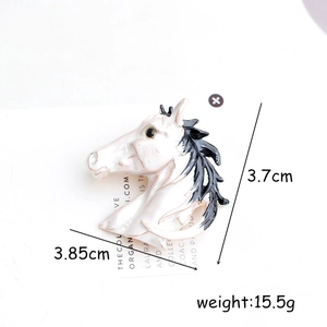 Retro white horse head brooch with black enamel accents and 3.7x3.85cm dimensions