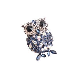 Retro owl pin brooch with blue rhinestones and black gem eyes on silver metal base