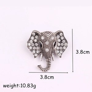 Vintage elephant pin brooch with sparkling crystals in silver tone, size 3.8x3.8cm