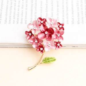 Exquisite floral rhinestone brooch with pink enamel petals and gold alloy base