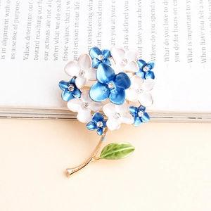 Elegant hydrangea flower brooch with blue and white petals and sparkling rhinestones