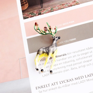 Artistic alloy reindeer brooch with colorful oil drip finish and crystal accents