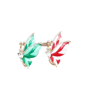 Elegant butterfly brooch with green and red rhinestones on a gold alloy frame