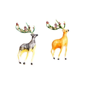 Artistic elk brooch pair with green antlers and vibrant enamel finish on white background