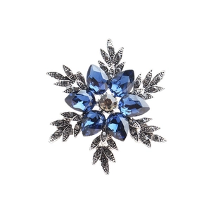 Elegant snowflake brooch with deep blue crystals and retro silver plating for women