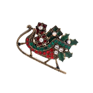 Spilla vintage a forma di slitta di Natale in bronzo con smalto rosso e strass lucidi
