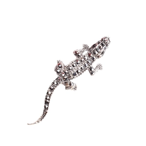 Broche crocodile mignonne de style occidental avec cristaux gris sur base argentée