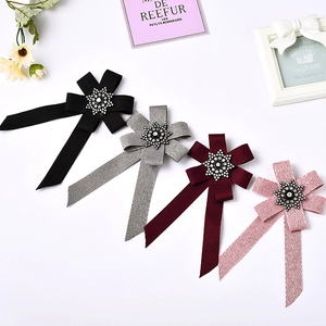 Elegant striped bow tie brooch with star rhinestone decoration in four colors